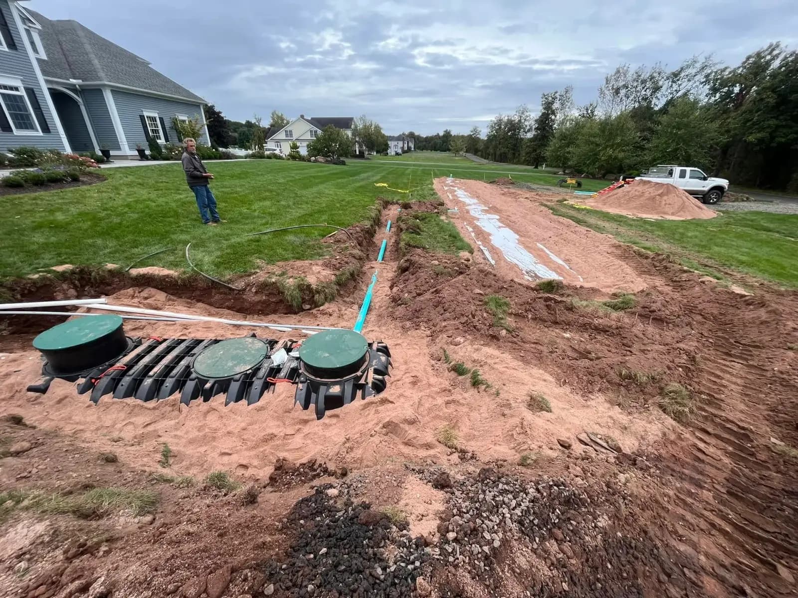 A newly installed septic system and leach field laid out in a Connecticut yard before backfill